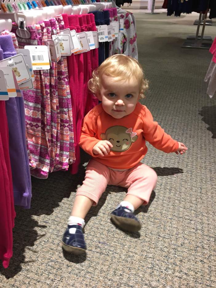 I took her shopping with me. Here she is about to pick out some pants.